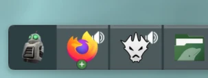 Screenshot of the taskbar of a Fedora KDE setup. There are multiple icons. From left to right: Clank as the application launcher icon, Firefox, fooyin music player, Dolphin file explorer.